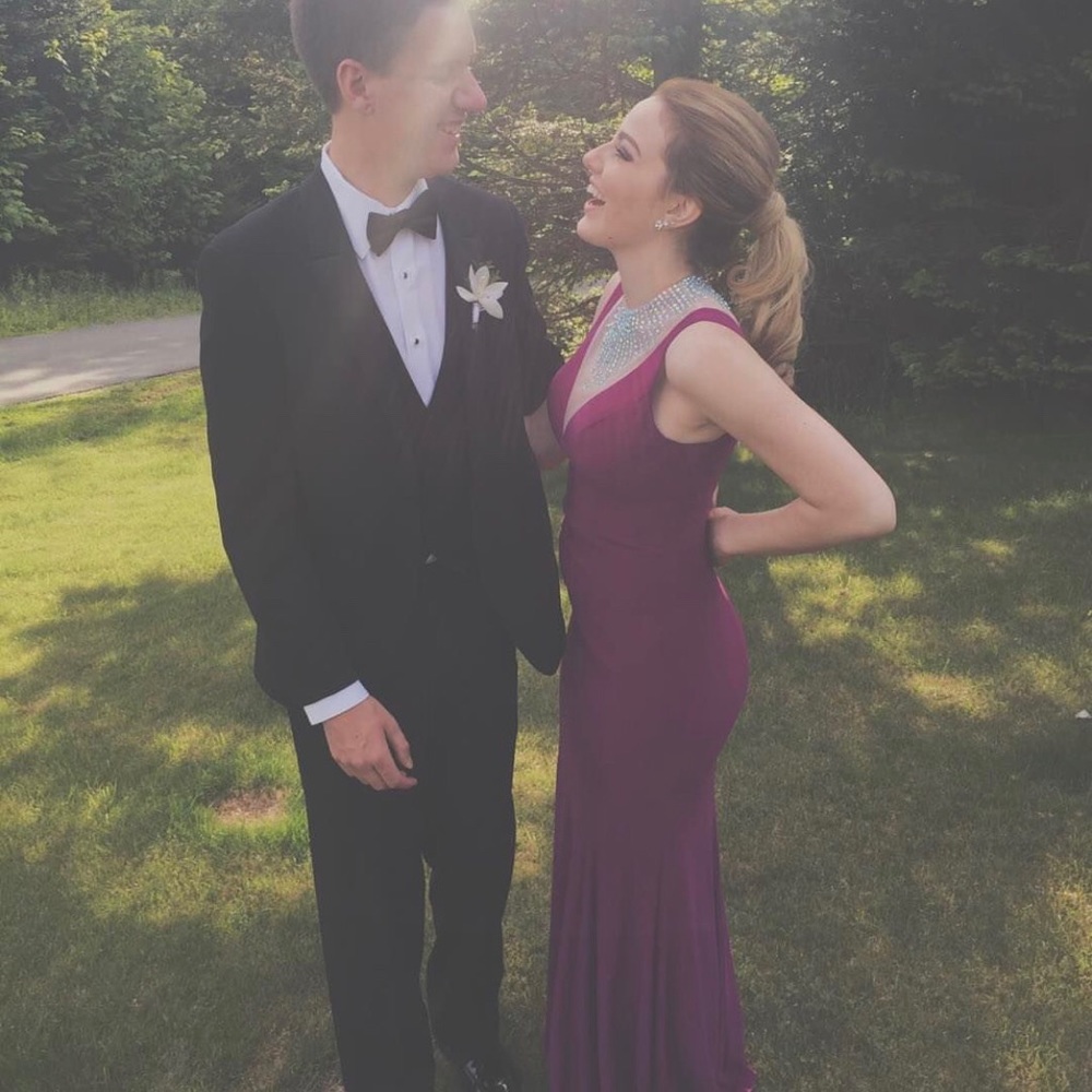 Purple fitted prom dress with deep v